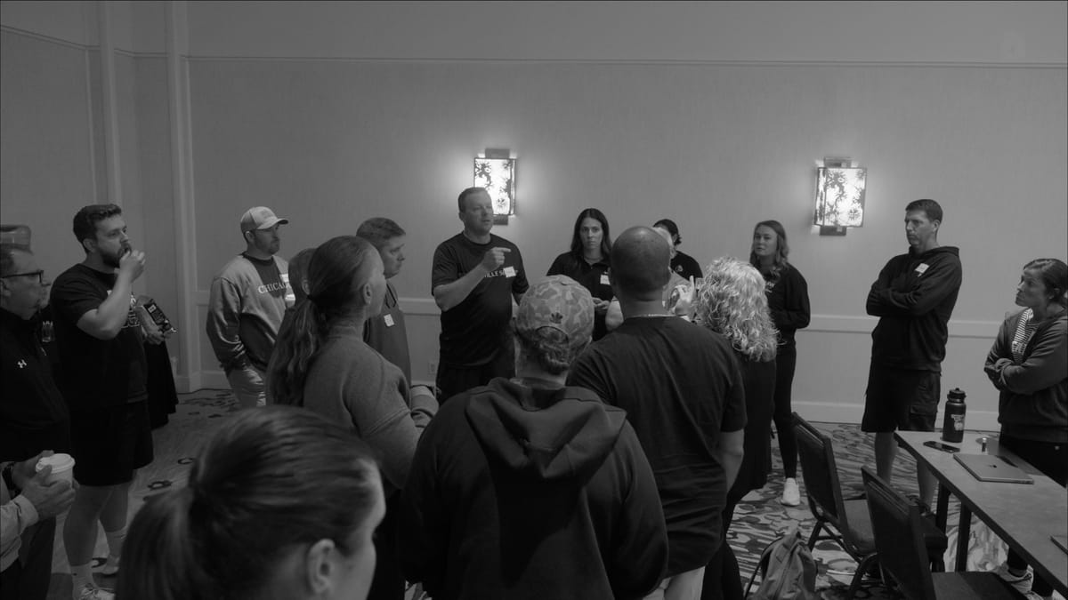 Coaches in a breakout discussion